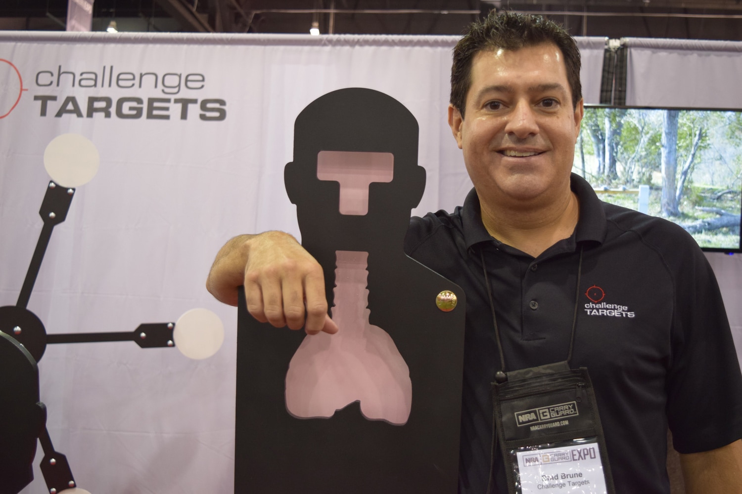 Brad Bruce, president of Challenge Targets, shows of his new iteration of reactive targets the "double entendre" (not the real name). (Photo: Daniel Terrill/Guns.com)