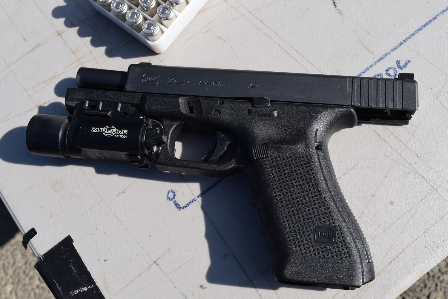 The Glock 22 handgun issued to ATF SRT agents. The .40-caliber pistol is equipped with a SureFire light. (Photo: Daniel Terrill/Guns.com)