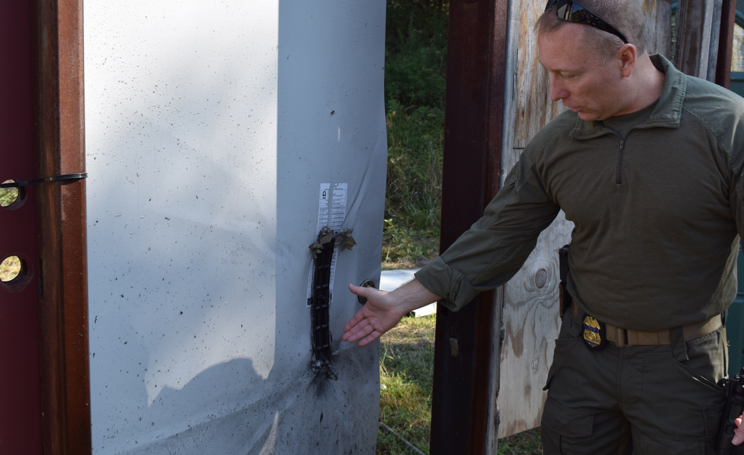 The breach bomb is designed to do just enough damage to open the door. SRT agents practice on a variety of doors in order to understand the science and art of breaching. (Photo: Daniel Terrill/Guns.com)
