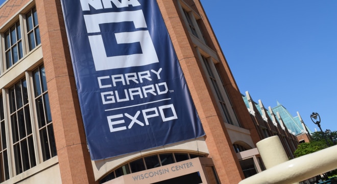 The ginormous “NRA Carry Guard” sign draped down the front entrance of the Wisconsin Center in Milwaukee on Friday, Aug. 25, 2017. (Photo: Daniel Terrill/Guns.com)