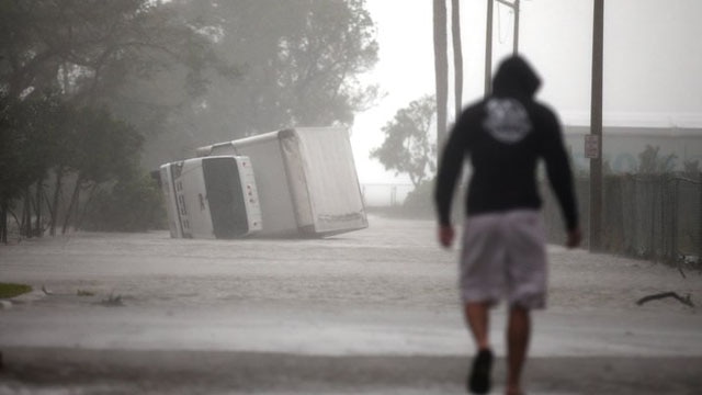 A truck overturned in flood waters as Hurricane Irma passed through Miami Sunday. (Photo: Thomson Reuters)