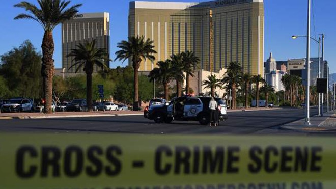 The crime scene outside Mandalay Bay after a mass shooting the night before. (Photo: The Mercury News)