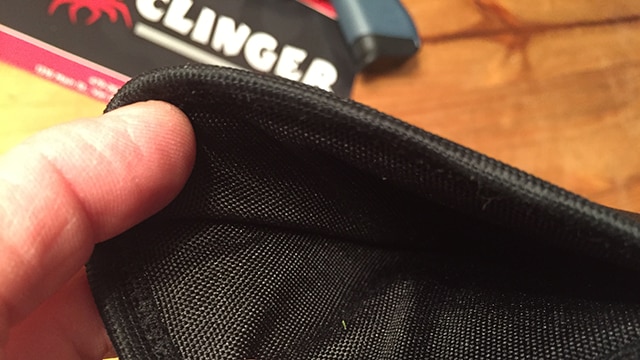 The nylon lining is non-abrasive, and Clinger promises their zig-zag stitched binding won't snag the rear sight. (Photo: Team HB)