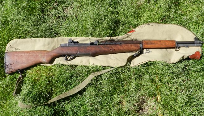 The 9.5-pound Garand, officially " U.S. rifle, caliber .30, M1" had a 24-inch barrel and wooden furniture. They cost the Army about $85 to produce during WWII and remained the standard American military rifle until the select-fire M14 came along in 1957. (Photo: Chris Eger/Guns.com)