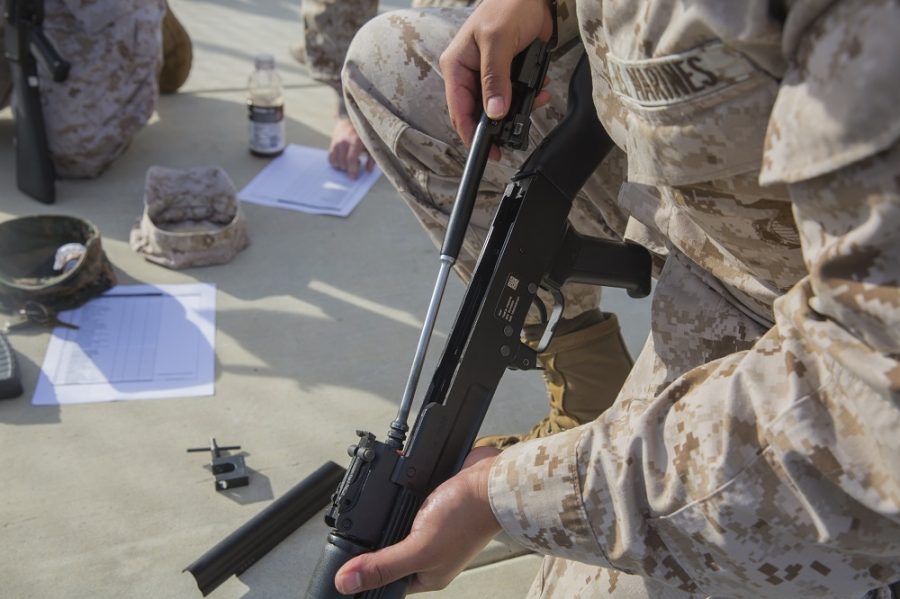 A Marine with Task Force Al-Taqaddum 18.1 Rotation 6 assembles an AK-47 assault rifle as part of a foreign weapons demonstration at Marine Corps Base Camp Pendleton, California, Jan. 16, 2018. The demonstration was done in order to familiarize the Marines with systems they may encounter while deployed overseas. (U.S. Marine Corps photo by Lance Cpl. Robert Bliss)