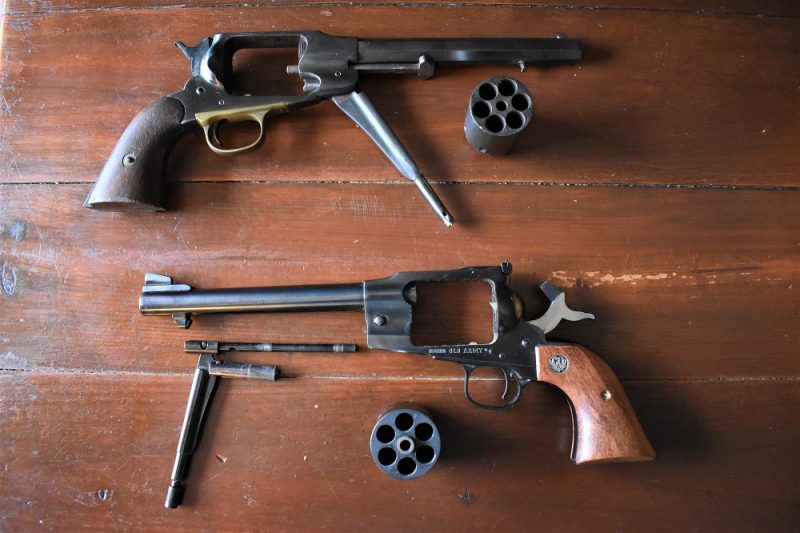 If you look closely at the Old Army, you will note that it has the flat-top and three-screw arrangement such as the original Ruger Blackhawks. Also, the Ruger uses a rounded barrel with much better sights rather than Remington's octagonal barrel.