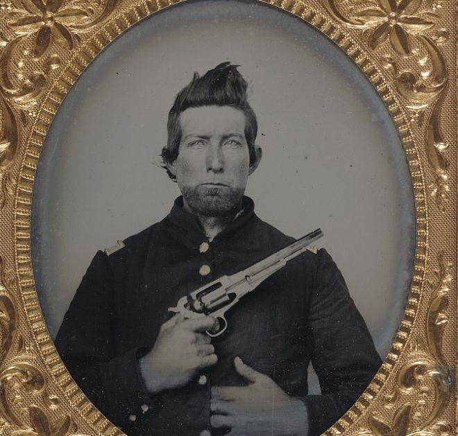 An unidentified cavalry soldier in Union frock coat with Remington New Model Army revolver. Please excuse the poor trigger discipline. (Photo: Library of Congress)