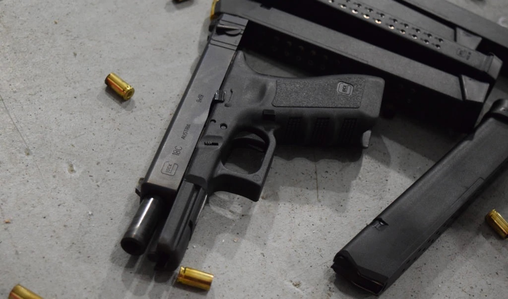 The Glock 18C is a compensated version of the G18, note the slide-mounted selector switch. (Photo: Guns.com)