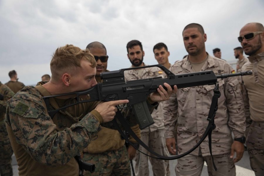 A U.S. Marine hefts a German-made Heckler and Koch G36 automatic rifle overseas, June 10, 2019. The HK G36 and semi-auto SL8 are constructed almost entirely of a reinforced carbon-fiber polymer. (Photo: U.S. Marine Corps)