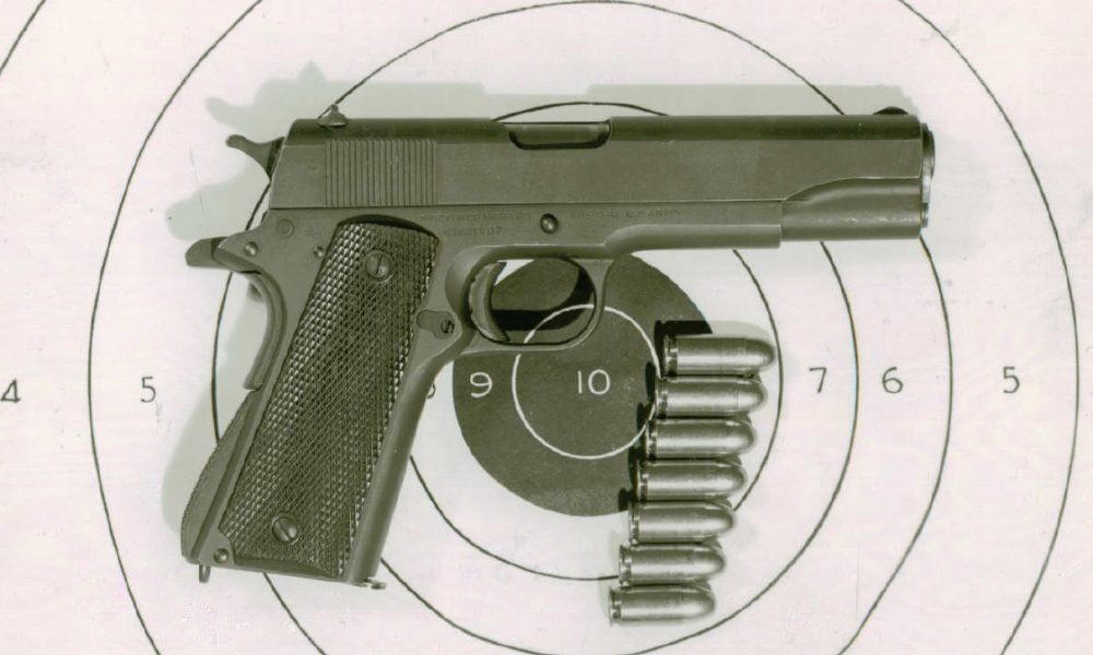 Right side view of a Colt M1911A1 pistol, with seven rounds 10972-SA.A.1