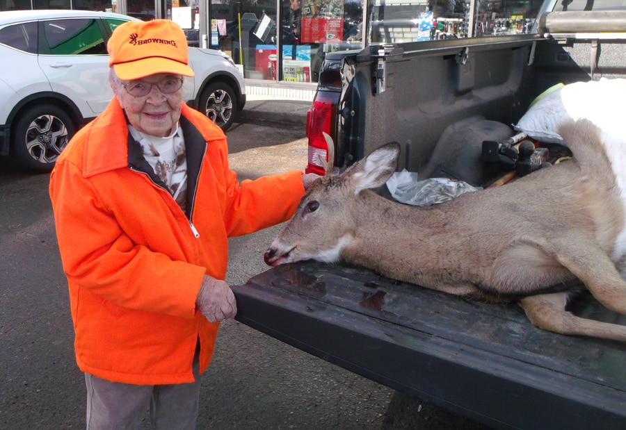 Florence Teeters stands with her first buck on her first hunt at age 104. (Photo: Bill Ball via Wisc DNR)