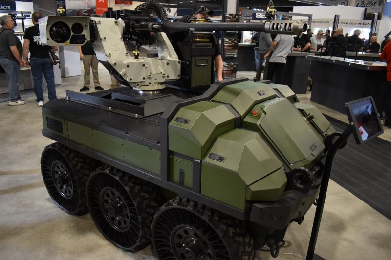 Then again, there was also an HDT Global Hunter Wolf 6x6 UGV complete with one of FN's deFNder remote weapon stations on hand...