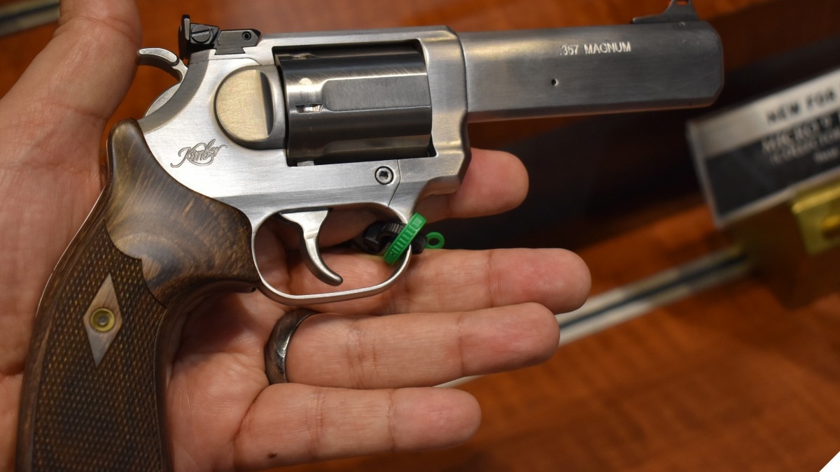 A Kimber 357 Magnum revolver in a large man's well-muscled hand