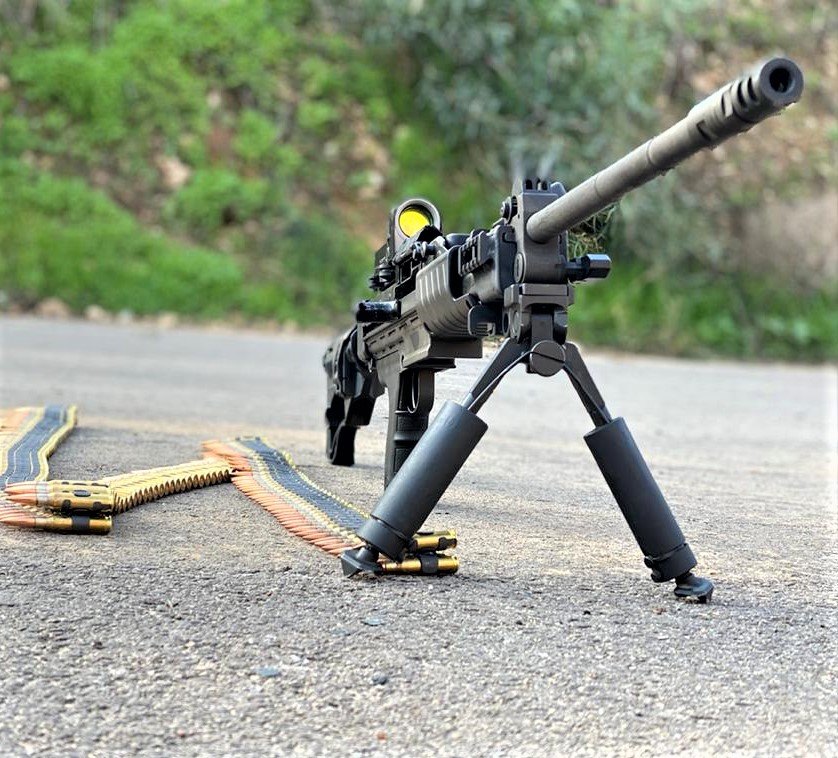 IWI Negev NG7 light machine gun with a belt of 7.62mm NATO ammo attached