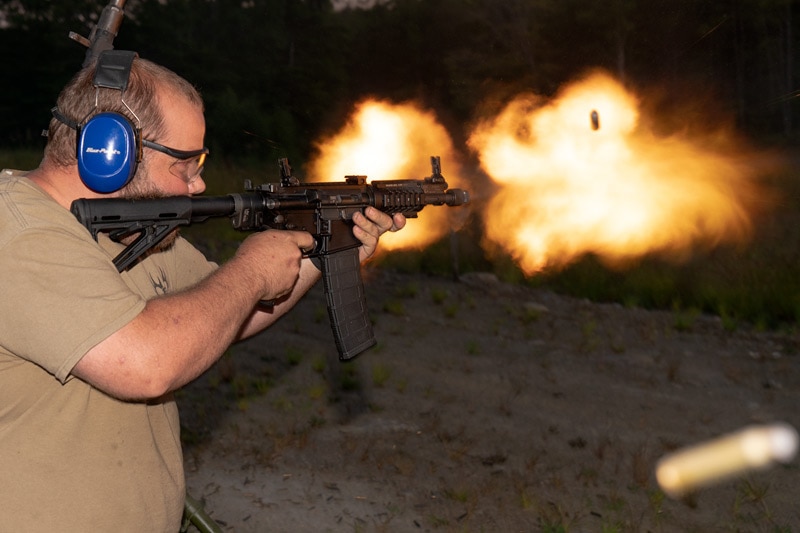 muzzle blast empty shell casings action photography