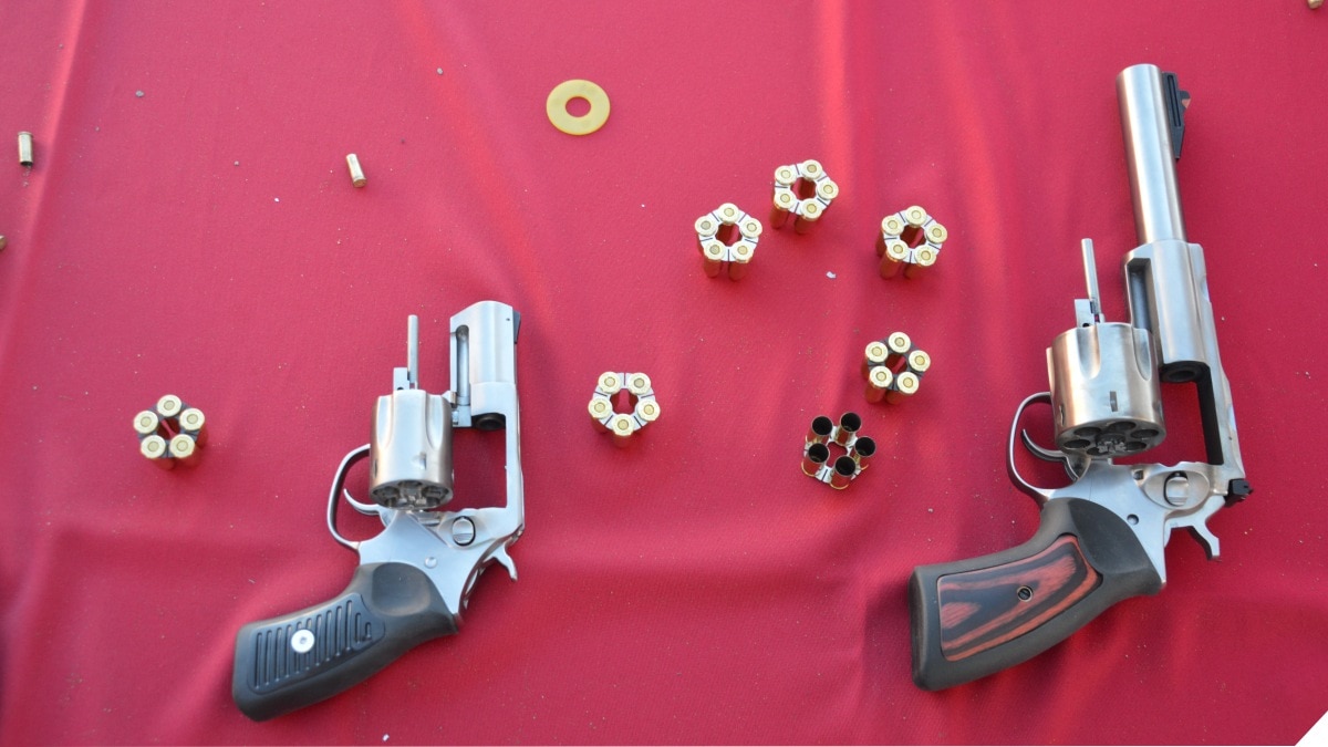 Ruger revolvers on a red table 