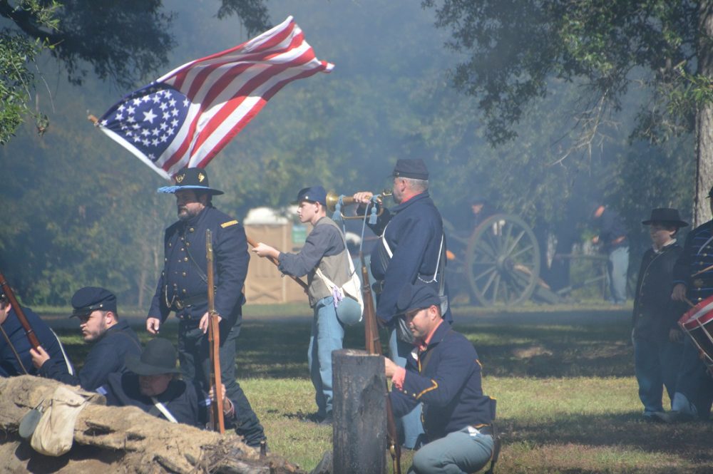 Civil War reenactors with a popular variant of the 34-star U.S. flag. A 19th Century Massachusetts-born sea captain, William Driver, defiantly flew his old flag from his Nashville, Tennessee, house during the conflict, reportedly telling a mob that came to take it down, "If you want my flag you’ll have to take it over my dead body." According to legend Driver was the first to term it, "Old Glory." (Photo: Chris Eger/Guns.com)
